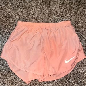 Coral nike running shorts